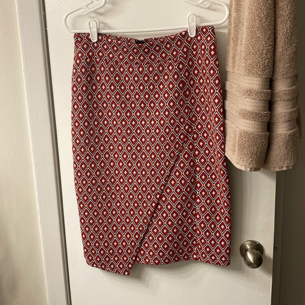 Anthropologie red pencil skirt great quality. Only worn a few times
